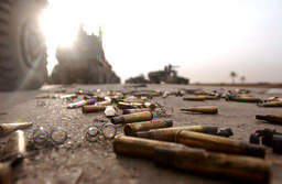 Spent cartridges littered the road after a battle between Marines and Iraqi forces on the road to Baghdad